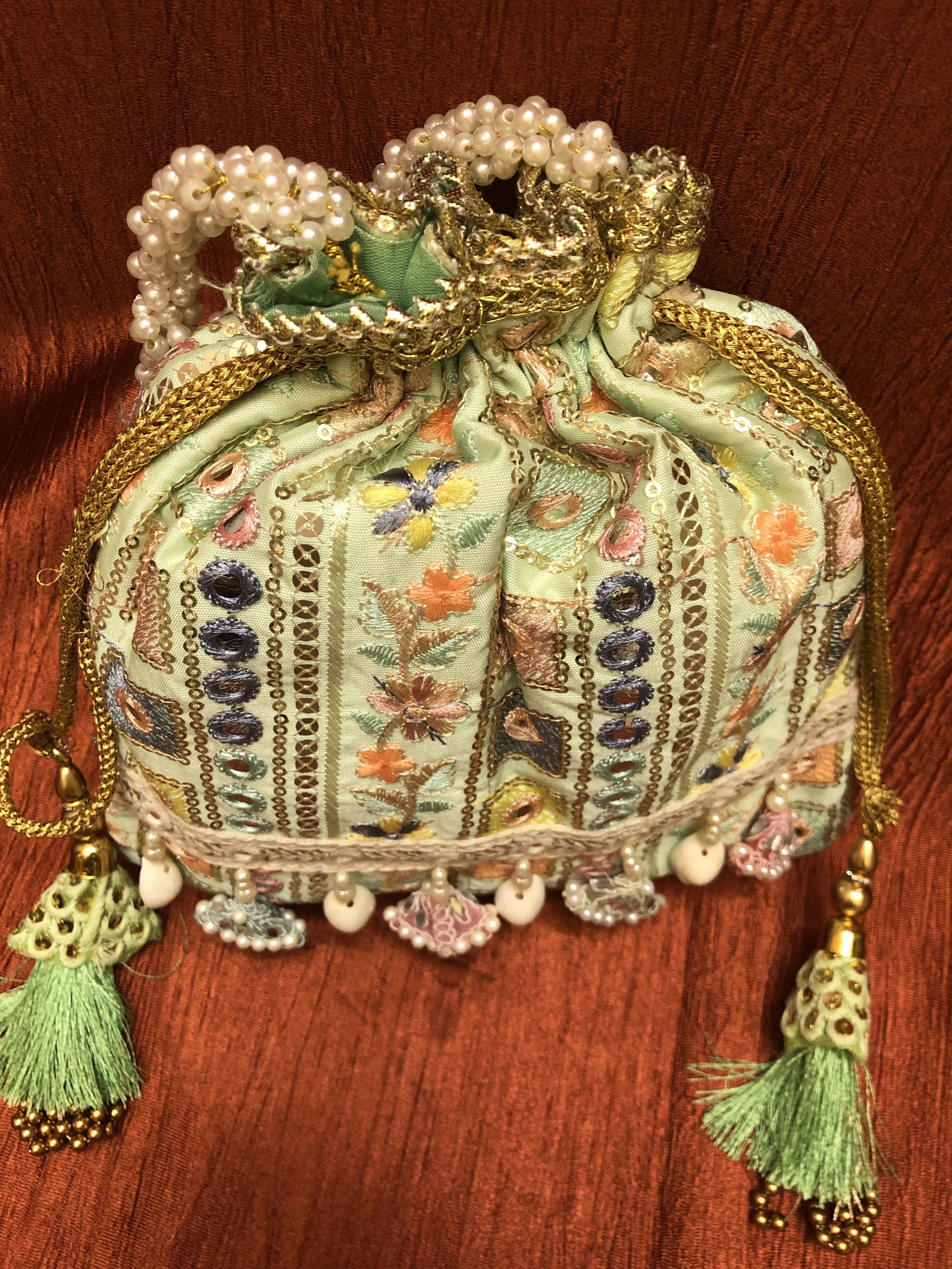 Light Green Color Potli Clutch Bag with Embroidery & Mirror Work